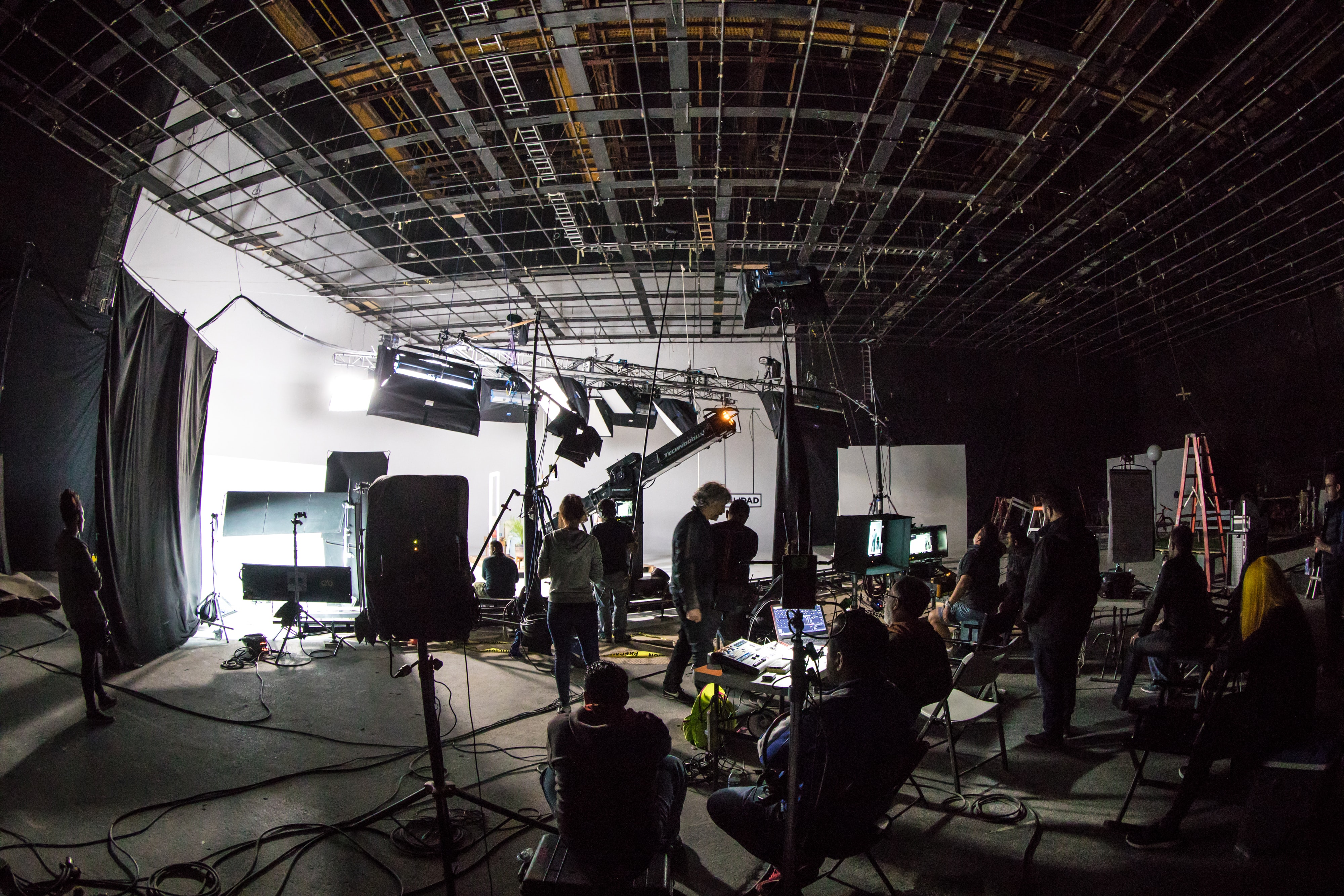 Image of a video soundstage wit a large crew