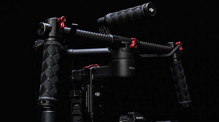 Gyro stabilizer camera mount with gimbal on black background